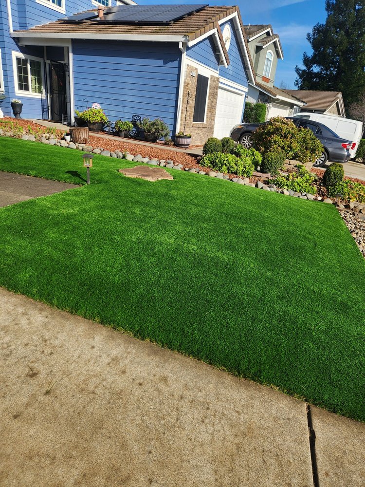 Artificial grass installation in Elk Grove CA showing completed front yard turf transformation by Cal Pro Artificial Turf